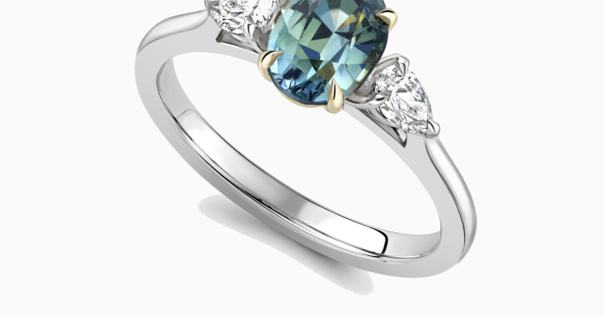 Cape Town | Bi-Colour teal sapphire trilogy engagement… | Blackacre